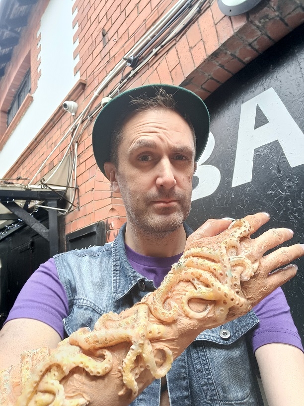 Nathan Head doubling as The Mogern's forearm in the original ending